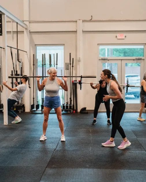 Ladies barbell training at The Tribe