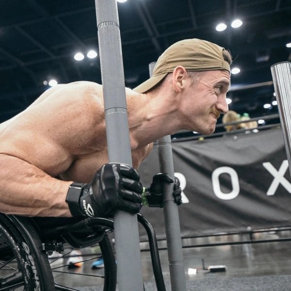 Man with hat training at The Tribe doing Hyrox